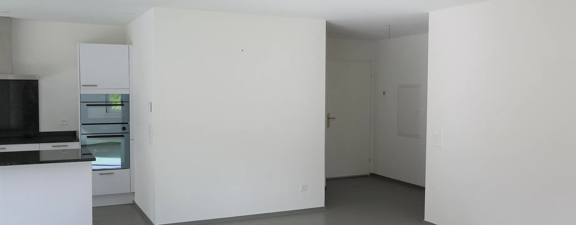 Wohnzimmer Sicht auf Eingang Wohnzimmer Sicht auf Eingang